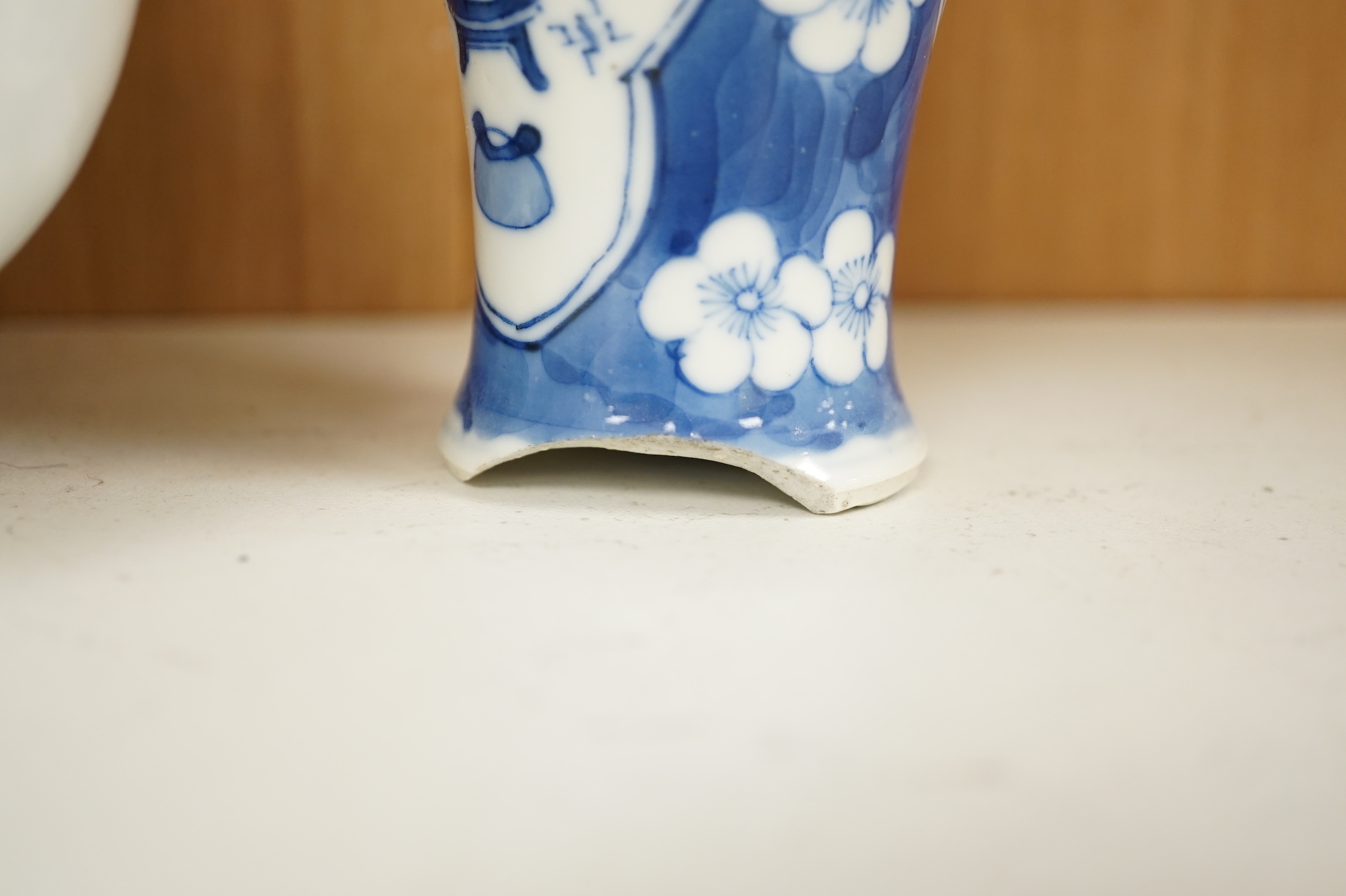 A Chinese armorial blue and white bottle vase, Qianlong/Jiaqing period, and five assorted 19th century Chinese blue and white vases, tallest 20cm; faults